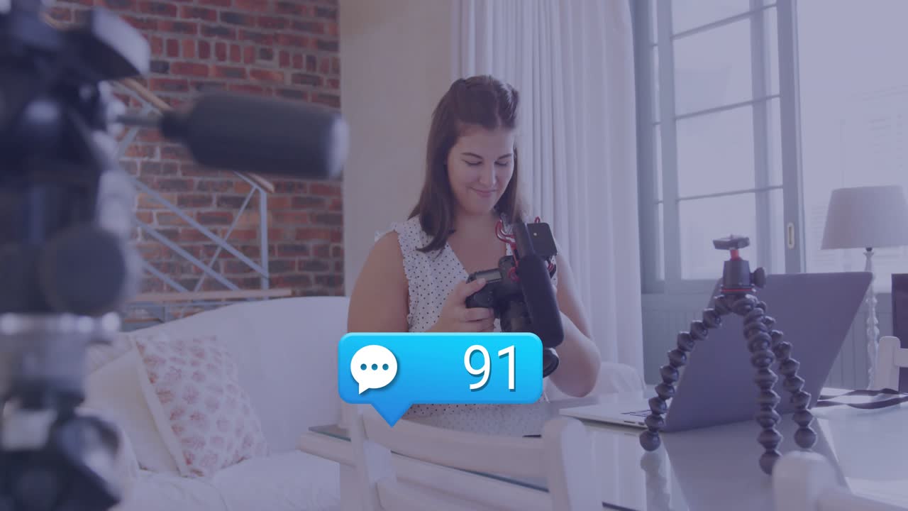 While comment bubble count climbing to 95 tech vlogger adjusting DSLR settings mounting on tripod