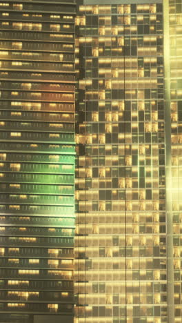 close-up of a skyscraper facade at night