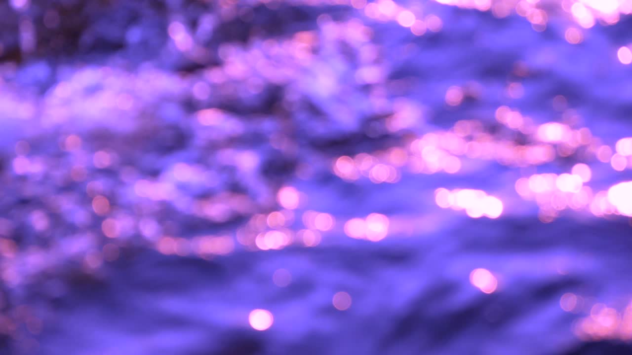 абстрактный размытый боке розовый на фиолетовом фоне