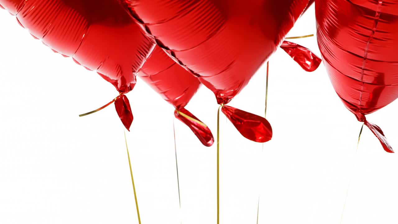 globos rojos flotando en el aire 4k