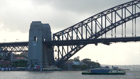 A-Sydney-ferry-passes-over-the-harbour-during-the-morning-in-Australia