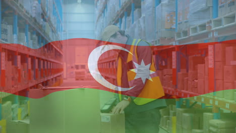 Warehouse-worker-handling-packages,-Azerbaijan-flag-animation-over-shelves-and-boxes