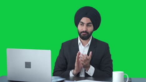 sikh indian businessman appreciating employees green screen