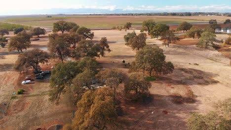 aerial drone fly over of a rural farmhouse