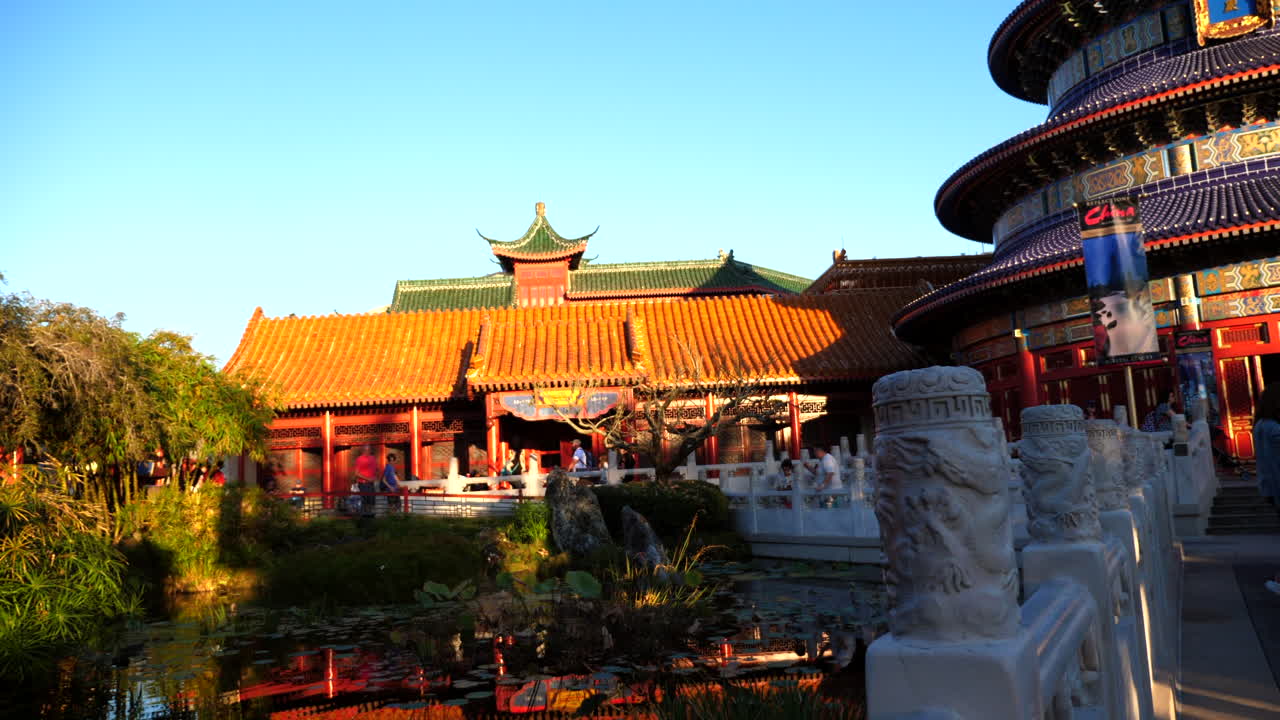 China Pavillion in Epcot, Disney World on a sunny day with a crowd of people