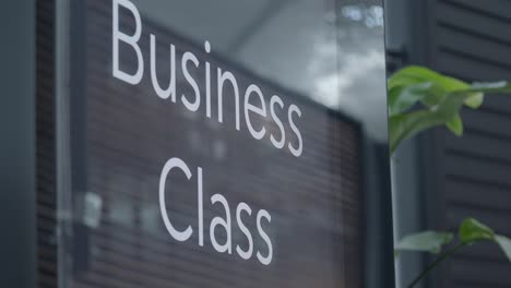 business class sign at an airport
