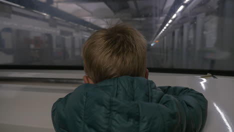 child traveling in underground