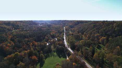 aerial view of fall colors along a winding country road