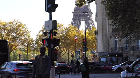 paris street scene with eiffel tower in the background