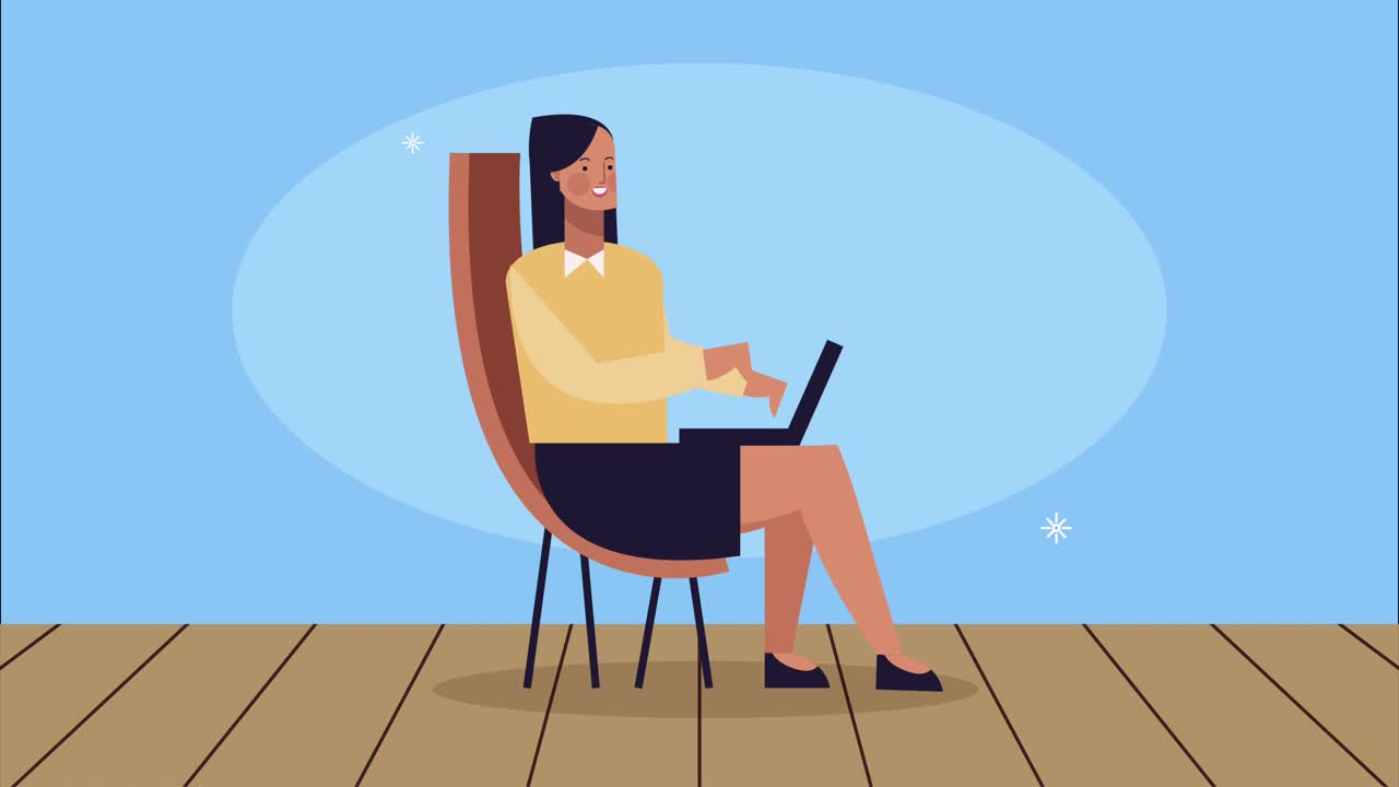 successful woman using laptop in chair