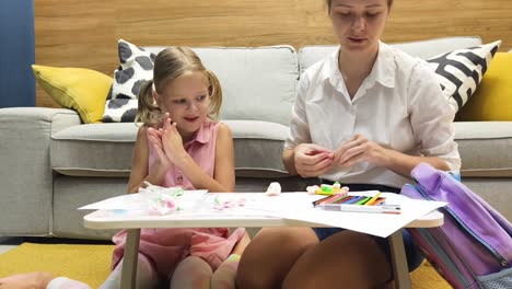 mother and daughter engaging in creative activities