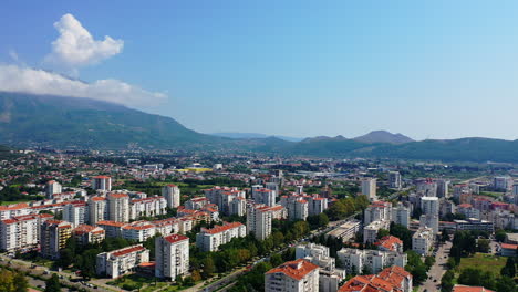 beautiful cityscape of the city bar at the adriatic seashore of montenegro. sunny panorama of urban landscape from top.