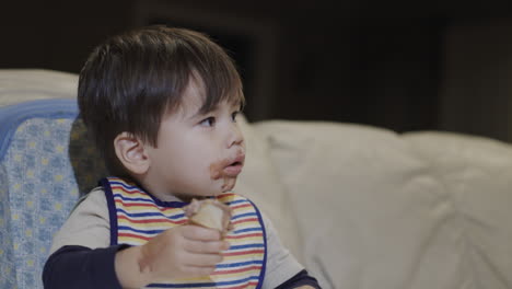 cute asian baby eating ice cream