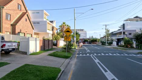 a journey through a suburban street with changing scenery.