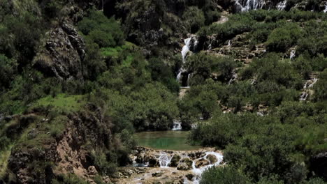 Waterfalls-with-ponds-in-Ayacuho-Peru-Pan-Up