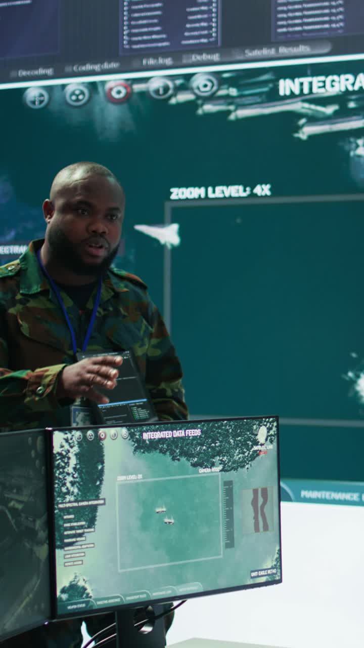 Vertical Video Military officer leads cybersecurity efforts in a high tech control center
