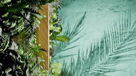 a wooden podium surrounded by tropical green foliage with palm leaf shadows on green textured wall. minimalist product display template. summer and nature concept. wallpaper.copy space. vertical