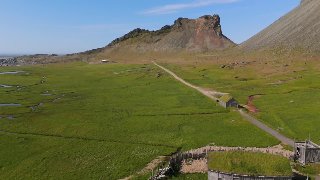 Marvel at the striking contrasts of land and sea in the Viking Village, beautifully captured from above. This drone footage invites you to immerse yourself in Icelandic heritage.