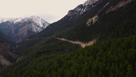 Aerial-drone-shot-of-winding-road-near-Duffey-Lake,-British-Columbia