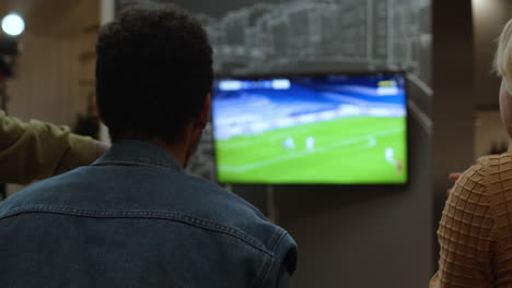 meeting of male friends in an apartment