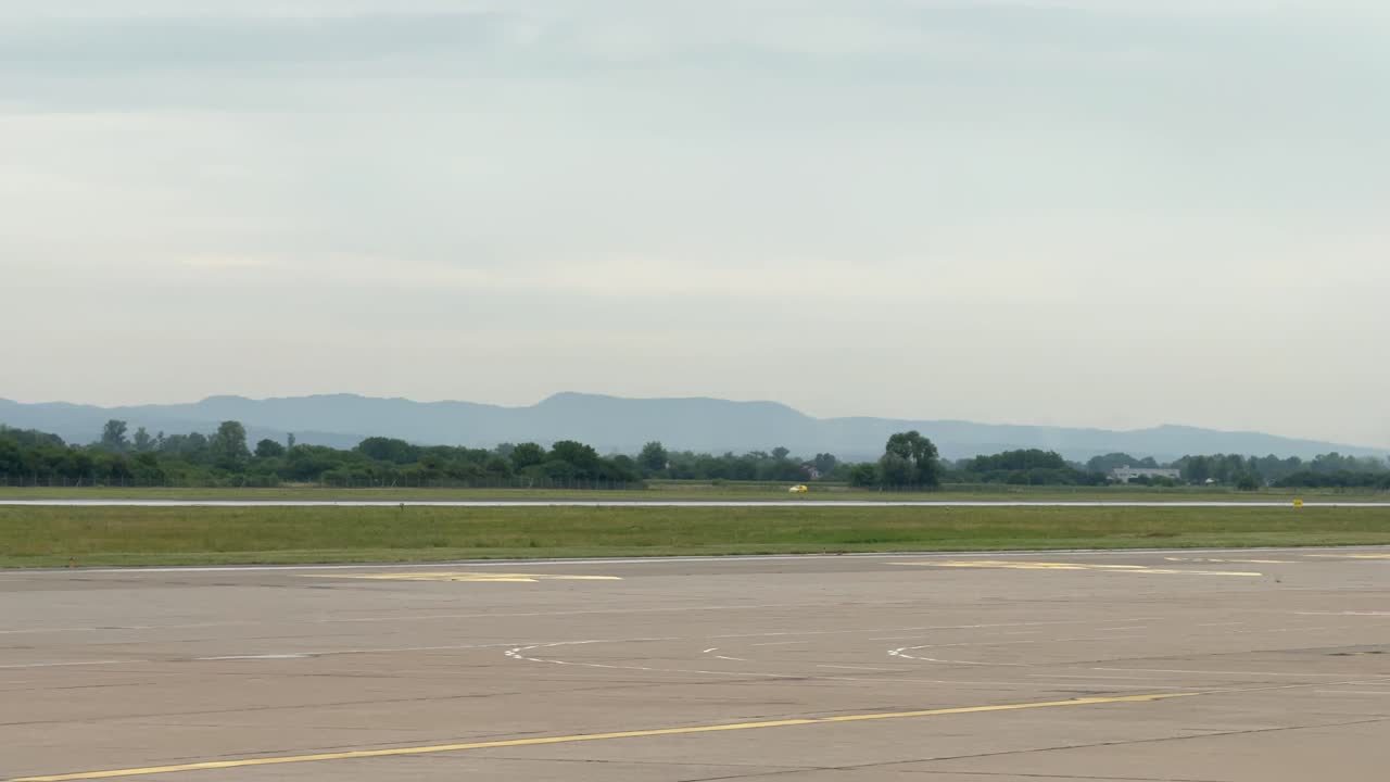 Croatian Air Force Dassault Rafale Fighter Aircraft Lifting Off The Runway With Landing Gear Still Down. wide shot