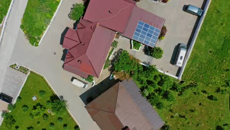 modern building and car parking in summer. apartment complex among nature. view from above on roofs of new hotel. aerial view.