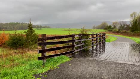 A-beautiful-wooden-pedestrian-footbridge-in-grasslands-in-the-Appalachian-mountains