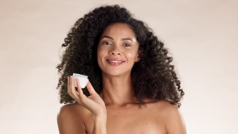 face cream, scent and black woman smelling jar