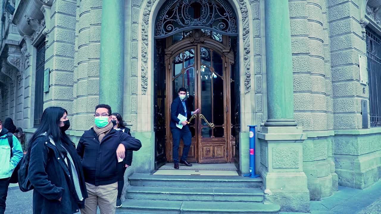 Tilt up of the entrance of the Intendencia de Santiago, current seat of the presidential delegation, Santiago, Chile.