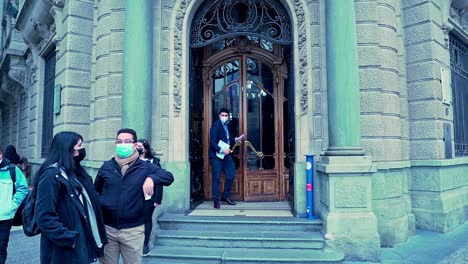tilt up of the entrance of the intendencia de santiago, current seat of the presidential delegation, santiago, chile.