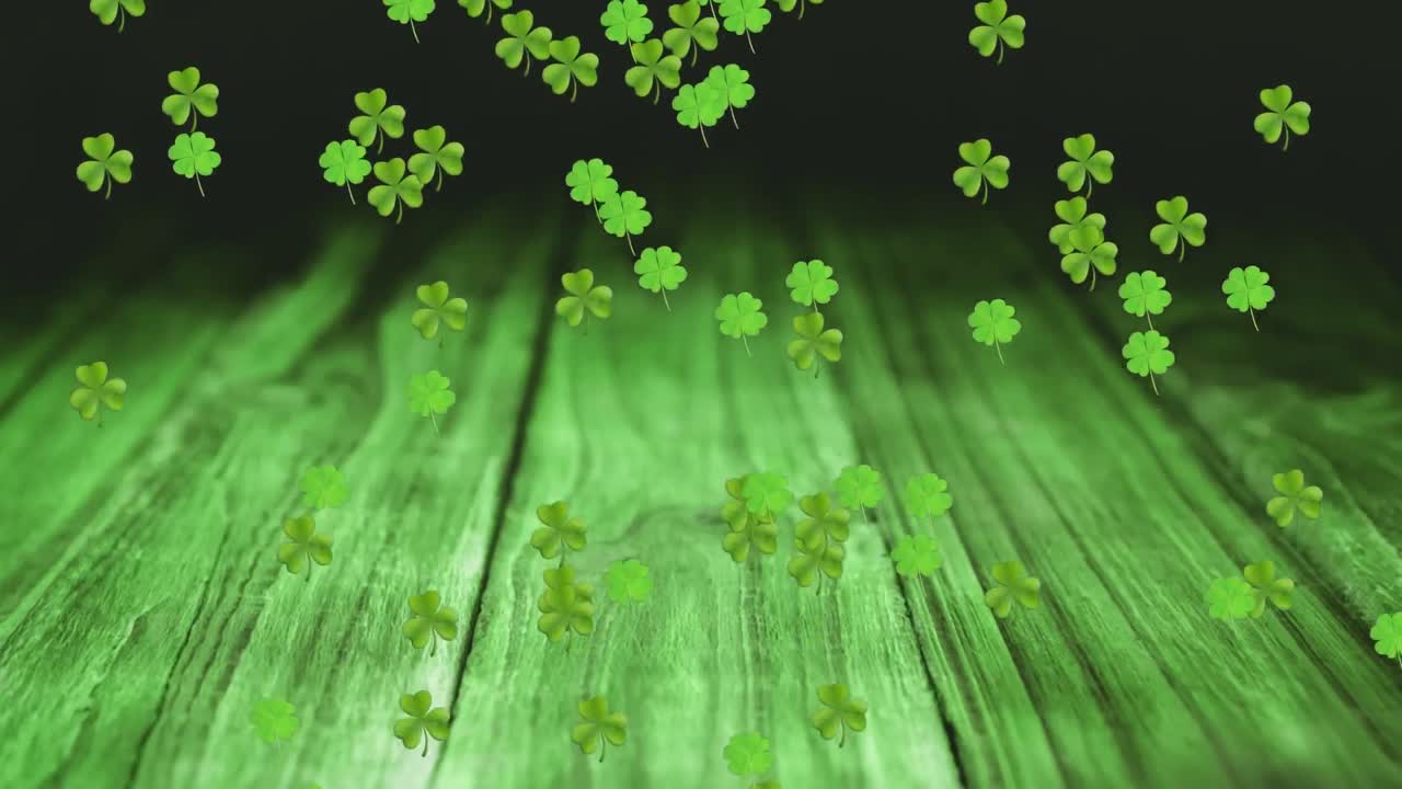Animation of green clovers falling for St. Patrick's day