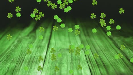 Animation of green clovers falling for St. Patrick&#039;s day