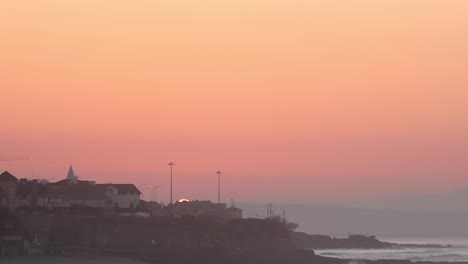 panoramic sunrise view over parede from a viewpoint in cascais morning timelapse