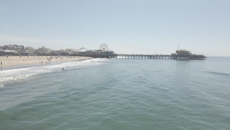 southern california beach and pier seen on a busy afternoon