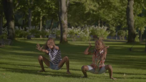 lovely african american kids dancing hip hop in park