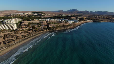 costa calma, fuerteventura: aerial view traveling in towards the coast and where you can see the resorts of the tourist area