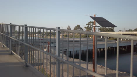 Walkway-above-highway-and-canal