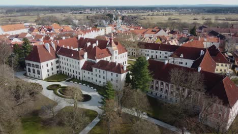 Small-castle-and-castle-grounds,-garden-park,-in-a-historic-town