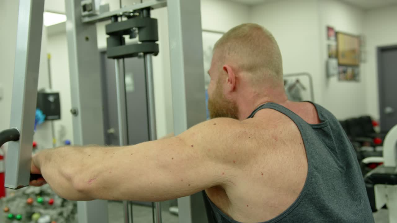 Sportsman Doing Exercises With Weight