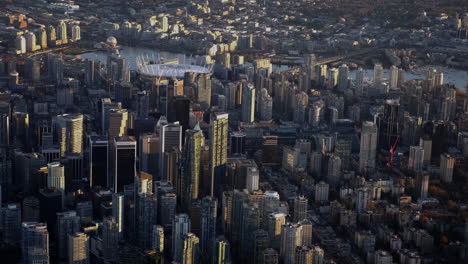 High-Angle-Shot-Of-BC-Place,-Cambie-Bridge,-And-Science-World-At-False-Creek-In-Vancouver,-Canada---aerial