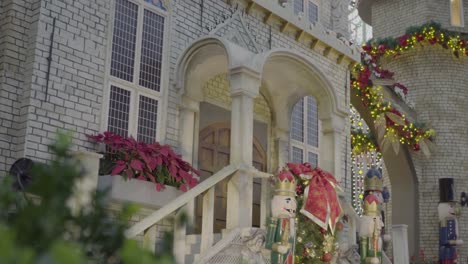 View-of-Castle-at-Poinsettia-Wishes,-Christmas-Exhibition-At-Flower-Dome-Gardens-By-The-Bay,-Singapore---close-up