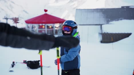 kid warming up before learning how to ski