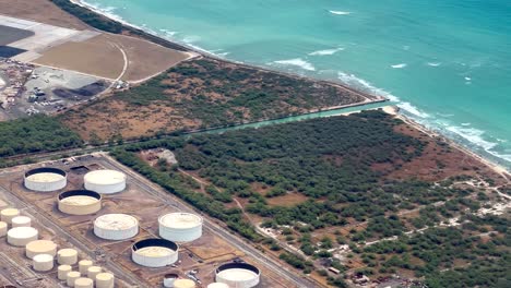 On-a-commercial-airplane-looking-out-the-window-over-the-Pearl-Harbor-National-Wildlife-refuge-and-the-city-of-Par-Hawaii