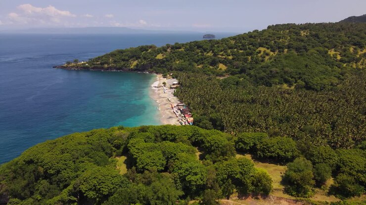 Aerial drone footage of Virgin Beach and Bukit Asah peninsula in Karangasem, Bali