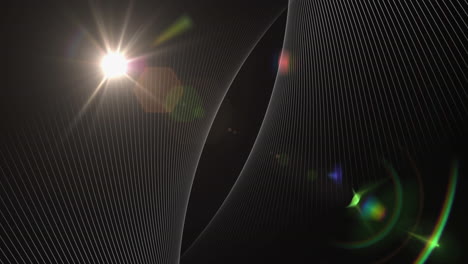 animation of spinning mesh with spots of lights moving on black background