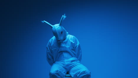 person in rabbit mask costume
