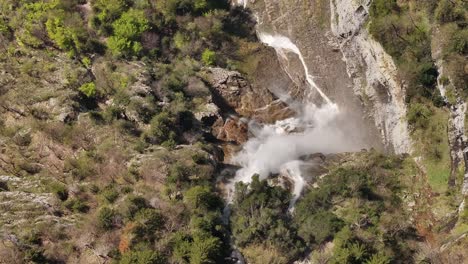 Bird's-eye-view-of-the-majestic-Seerenbachfälle-waterfall-in-Amden-Betlis,-Walensee,-Switzerland,-capturing-the-mesmerizing-cascade-from-above,-the-natural-beauty-of-the-Swiss-landscape