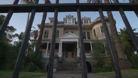 establishing shot of historic home in the east end district on galveston, island in texas