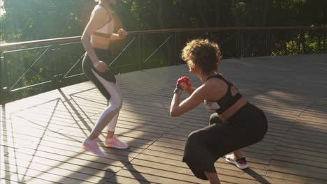 two women exercising outdoors