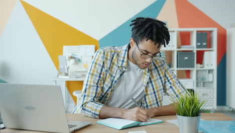young man working in a modern office